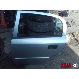Врата задна лява.Цената е за необорудвана.OPEL ASTRA G 1.6 16V 101 к.с.хечбек(1998-2004)